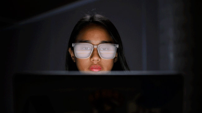 Girl staring at a computer screen