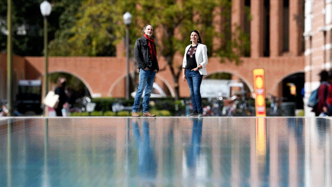 Man and woman standing on USC campus